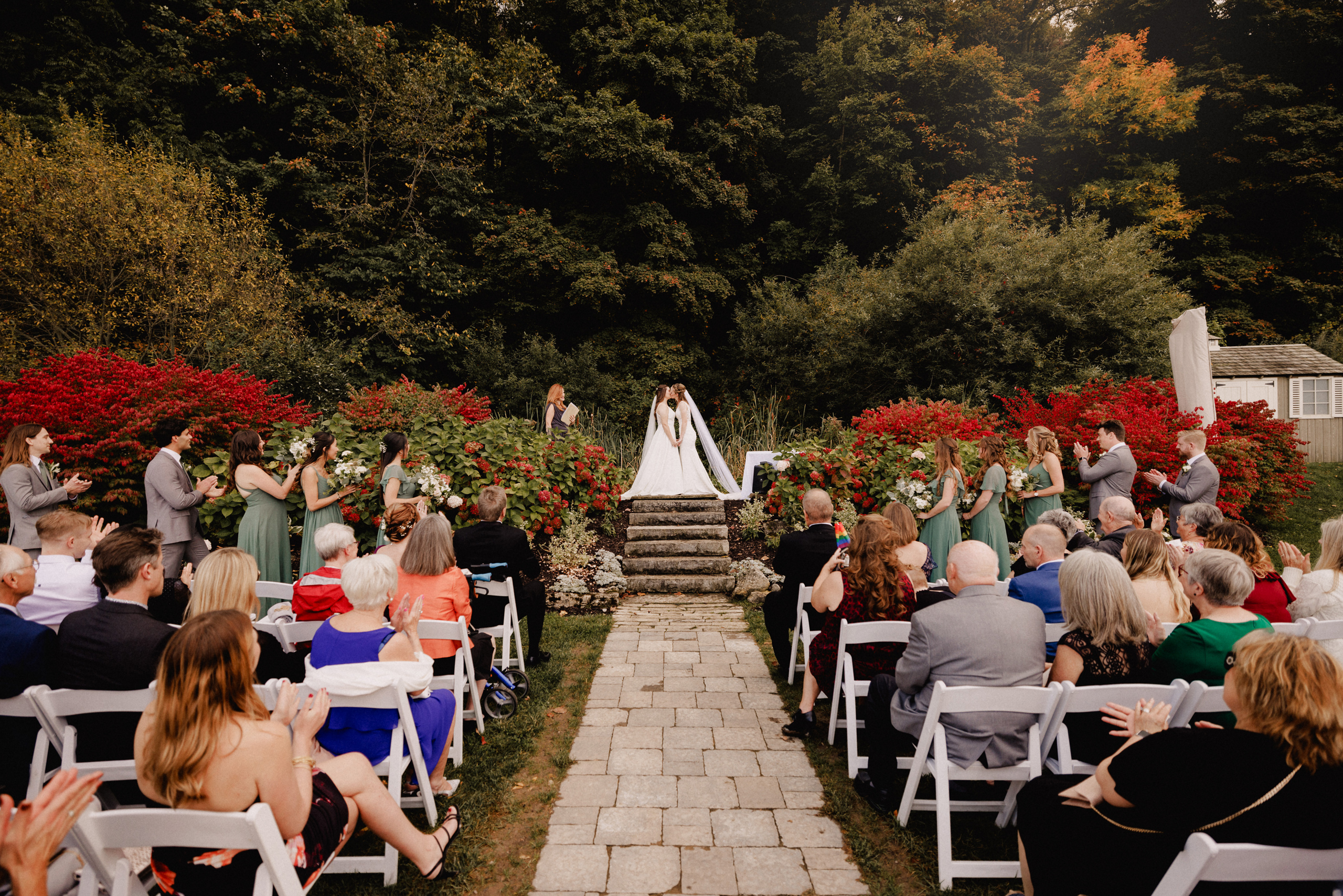 first kiss two brides escarpment site wedding cave spring vineyard october