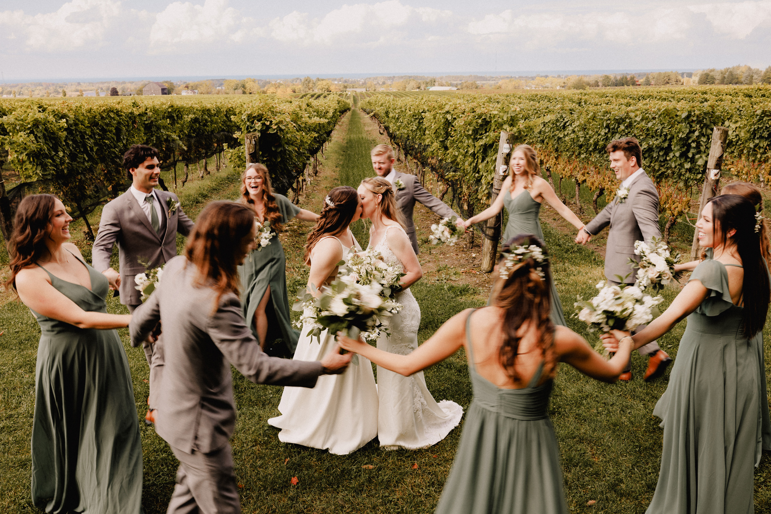 wedding party group photo cave spring vineyard fall autumn