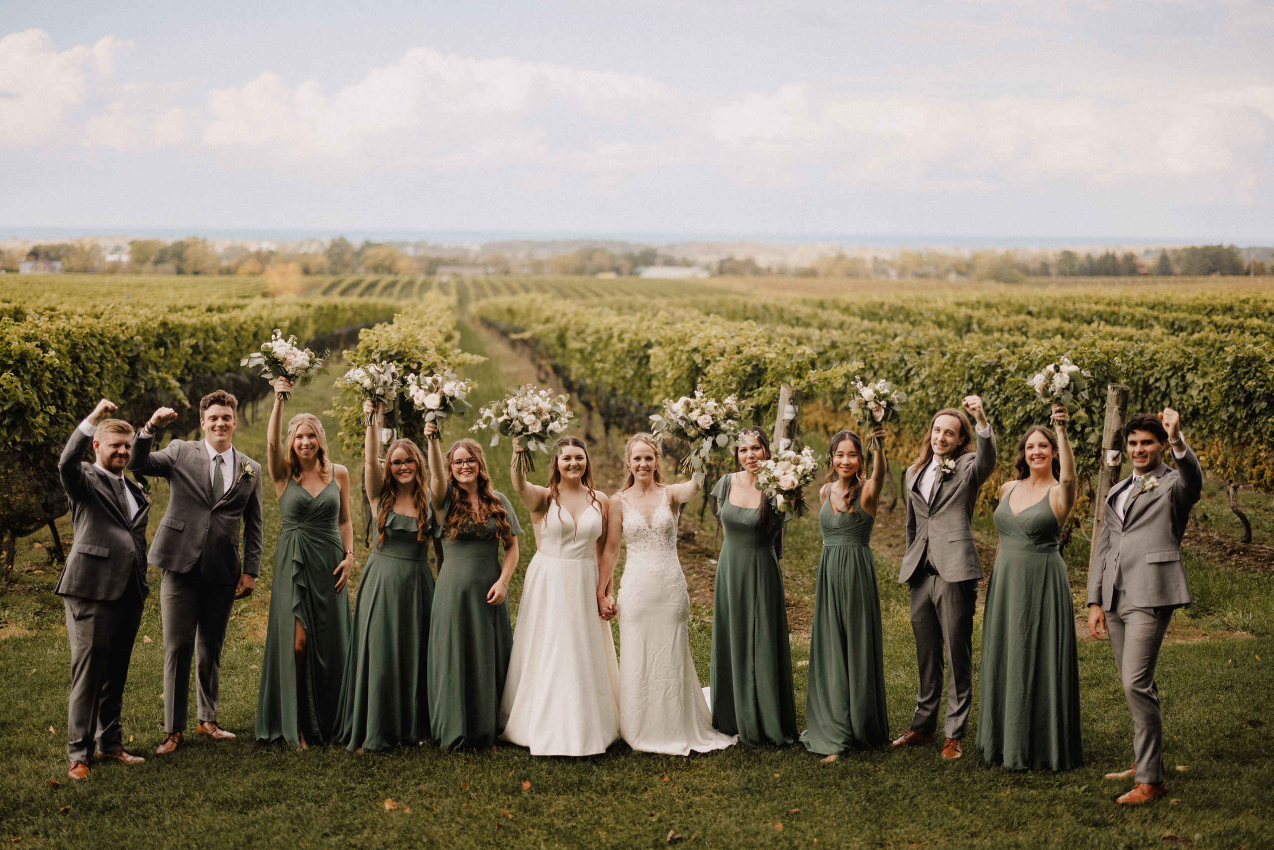 wedding party group photo cave spring vineyard fall autumn