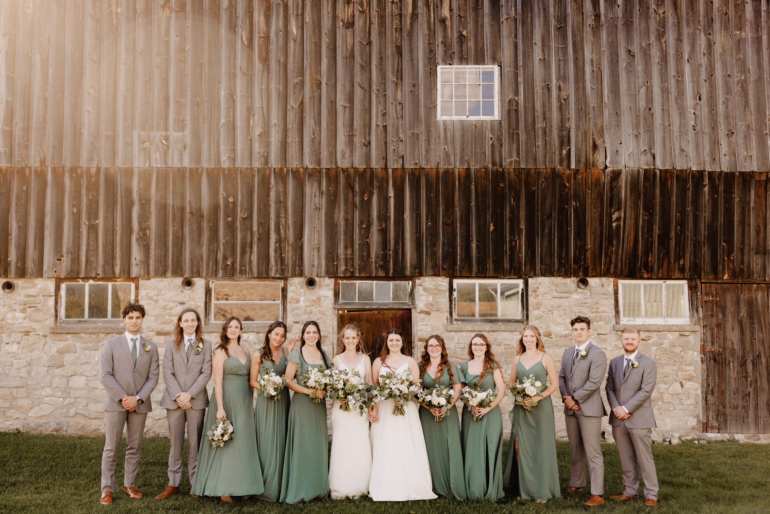 big group photo wedding party barn cave spring