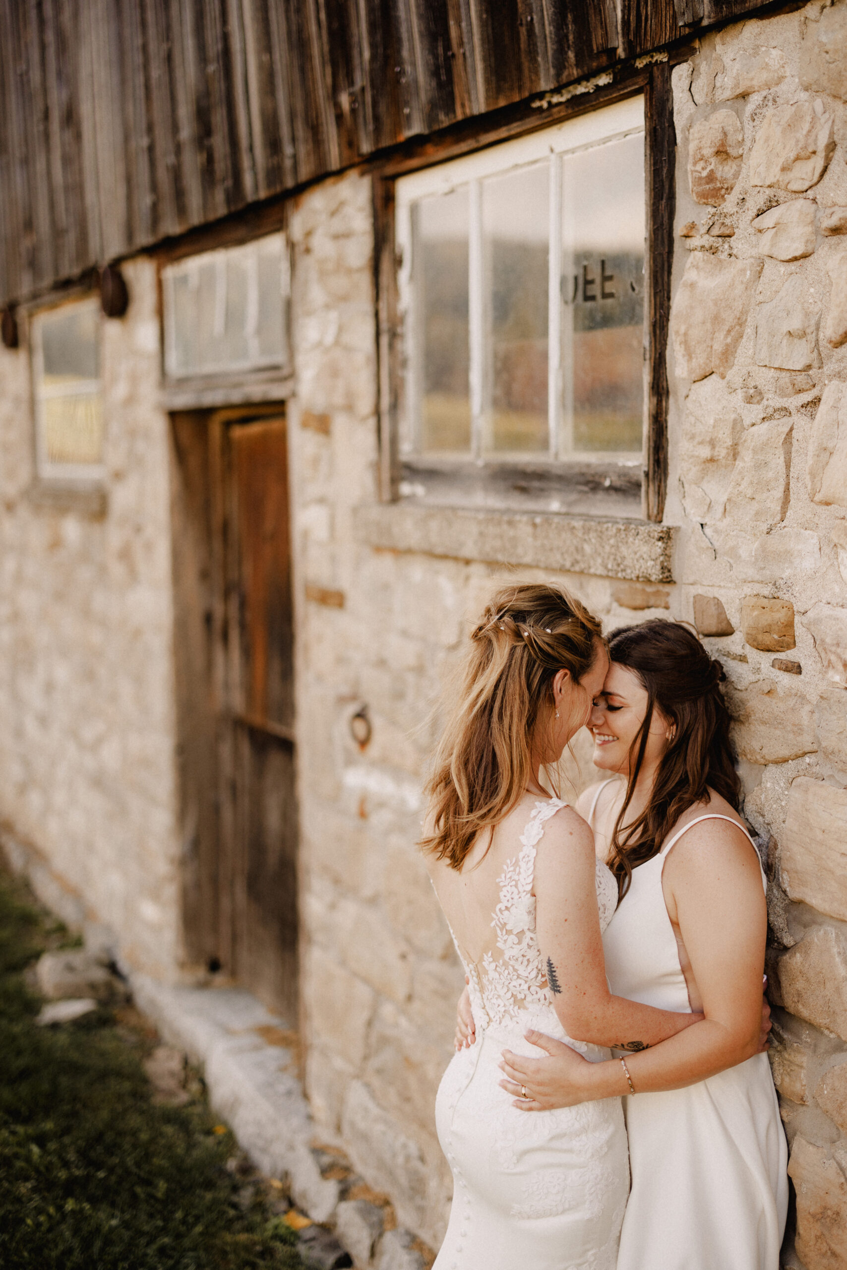two brides romantic wedding photography cave spring fall vineyard